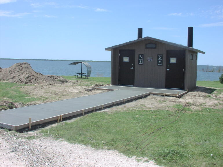 Vault toilet sidewalk