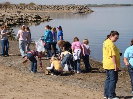 Girl Scouts picking up trash and treasures